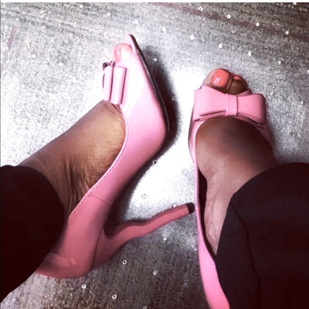 Pink patent leather peep toe pumps